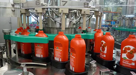 Décontamination à sec des emballages juste avant le remplissage
